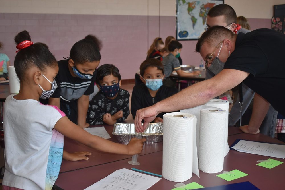 Superintendent Stefan Czaporowski visits a station at Franklin Avenue Elementary School during STEM Week. (AMY PORTER/THE WESTFIELD NEWS)